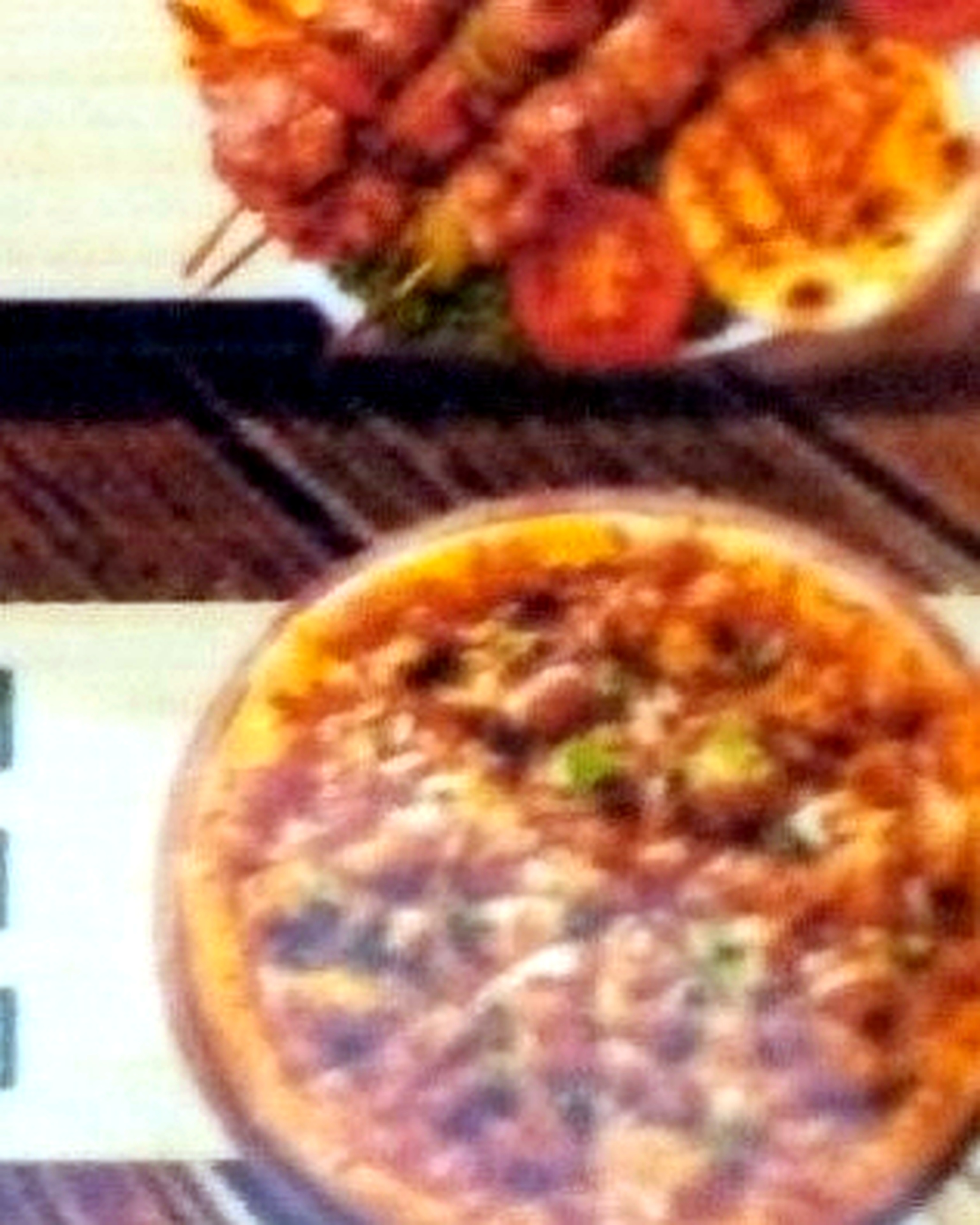 Pizza visual extracted from the supplied Trattoria menu